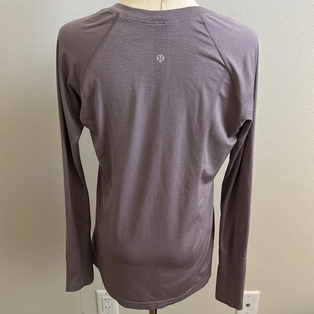 Lululemon lilac long sleeve shirt. Athleisure.size 10. Gently used as is.
